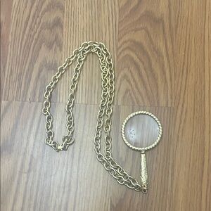 Elegant Gold Chain Necklace with Magnifying Pendant